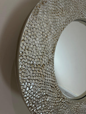 Close-up of a textured circular object with a white center