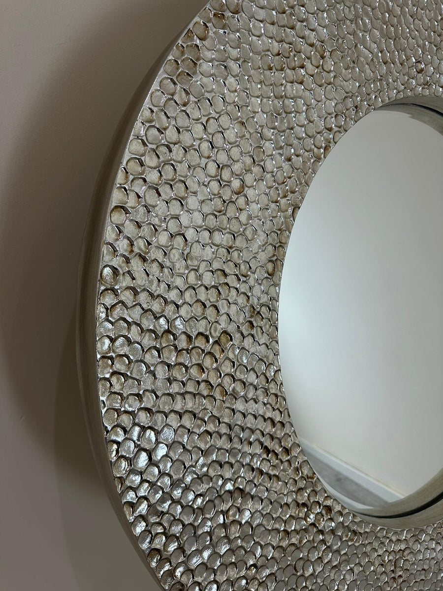 Close-up of a textured circular object with a white center