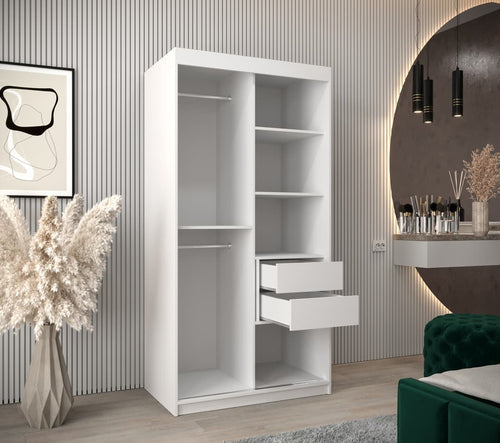 White wardrobe with open doors and drawers in a room with decorative elements.