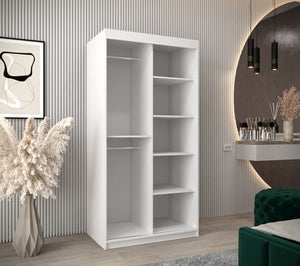White bookshelf in a room with decorative elements and a mirror.