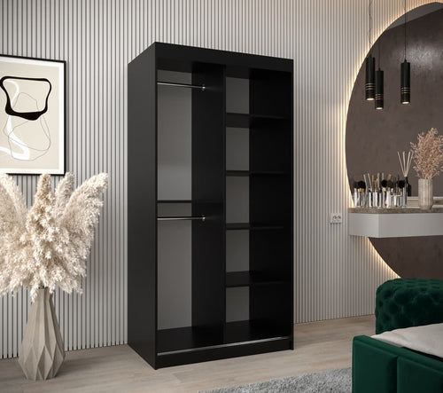 Black bookshelf in a modern room with decorative elements