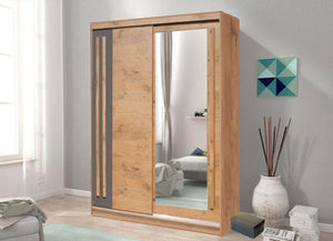 Wooden wardrobe with sliding doors in a room setting