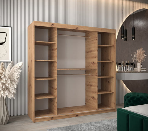 Wooden wardrobe in a modern room with decor elements.