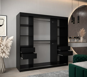 Black modern wardrobe with shelves and drawers in a stylish room.