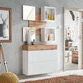 Modern interior design with white wall-mounted shelves, wooden accents, and decor items.