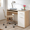 Wooden desk with chair and office supplies in a room with a window and plant.