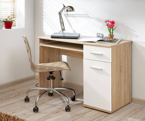 Wooden desk with chair and office supplies in a room with a window and plant.