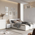 Modern bedroom with a bed, nightstands, and wall art in a neutral color scheme.