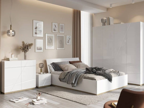 Modern bedroom with a bed, nightstands, and wall art in a neutral color scheme.