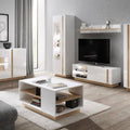 Modern living room with white and wood furniture, including a TV stand and coffee table.