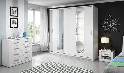 Modern bedroom with white wardrobe, dresser, and bed.