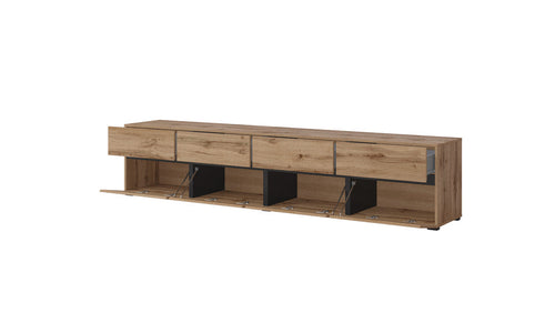 Wooden entertainment console with drawers and open shelf on a white background