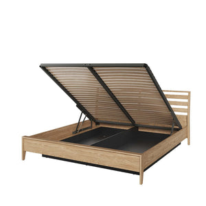 Wooden bed frame with raised platform on a white background