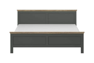 Gray bed frame with wooden accents on a white background
