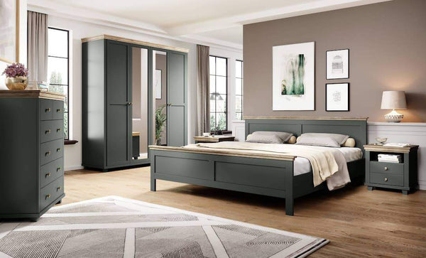 Modern bedroom with gray bed, wardrobe, and nightstands.