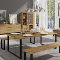 Modern living room with wooden furniture, including a dining table and benches.