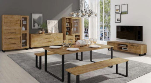 Modern living room with wooden furniture, including a dining table and benches.