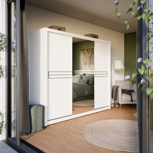 White wardrobe with sliding doors in a bedroom setting