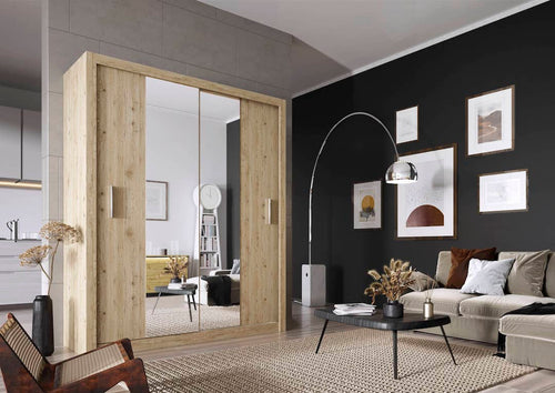 Modern living room with wooden sliding doors, black wall, and decor elements.
