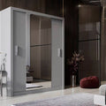 Modern wardrobe with sliding doors in a stylish room setting.
