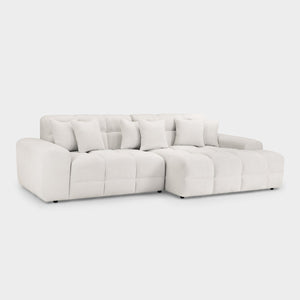 White sectional sofa on a light gray background