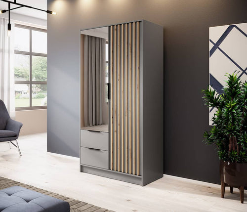 Modern wardrobe with mirror and wooden slats in a room with a window, plant, and gray chair.