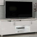 White TV stand with a black television on a gray wall background