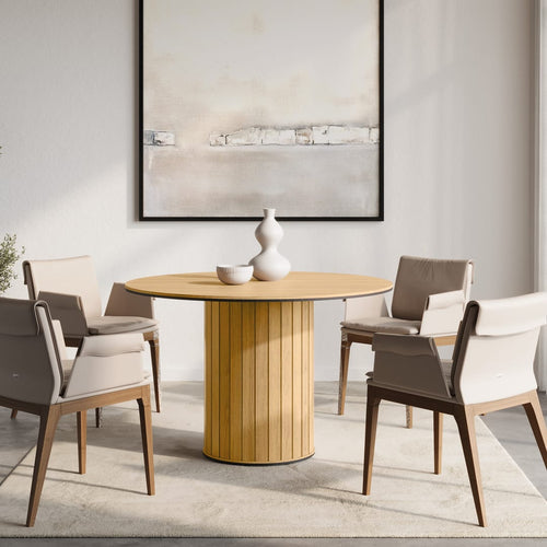 Dining room with wooden table and chairs in a modern interior setting.