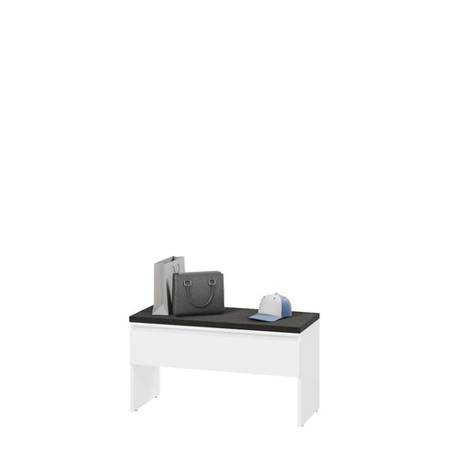 Small white table with a black top on a white background