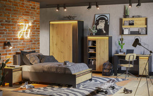 Modern bedroom with wooden furniture, brick wall, and decorative elements.