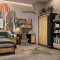 Modern bedroom with wooden furniture, including a bed, desk, and wardrobe.