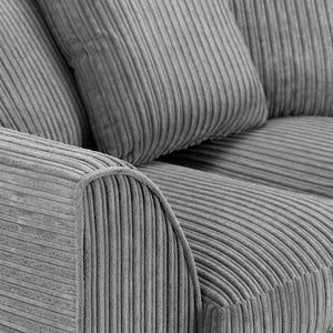 Close-up of a gray corduroy sofa