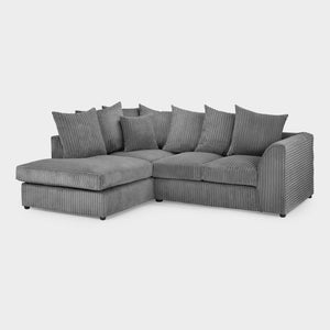 Gray sectional sofa with multiple cushions on a white background