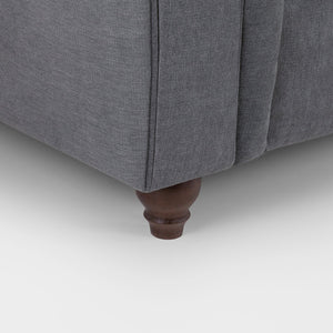 Gray upholstered furniture with wooden leg on a white background
