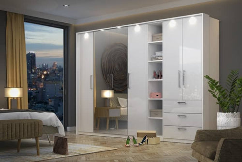 Modern bedroom with a large white wardrobe, bed, and cityscape view.