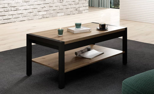 Coffee table with books and cups in a living room setting