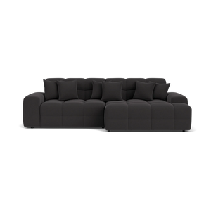 Black sectional sofa on a white background