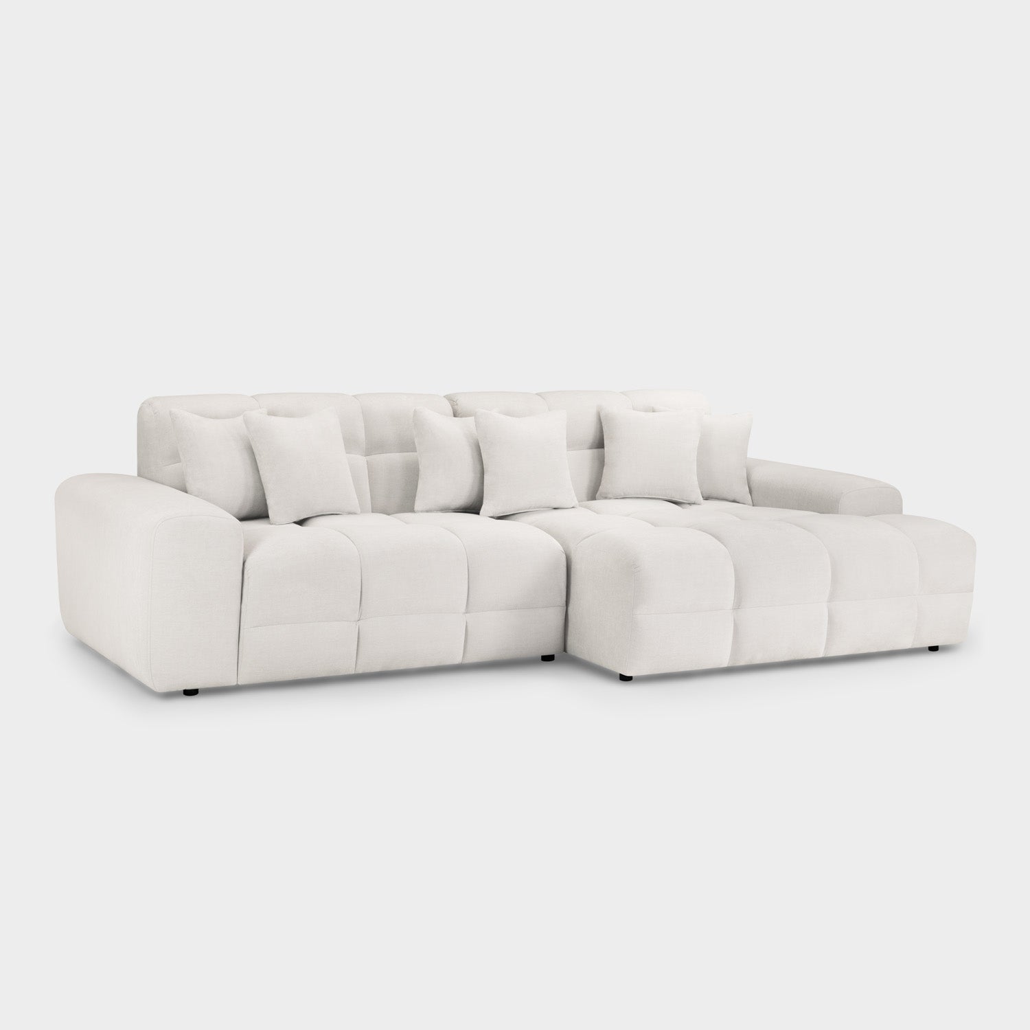 White sectional sofa on a light gray background