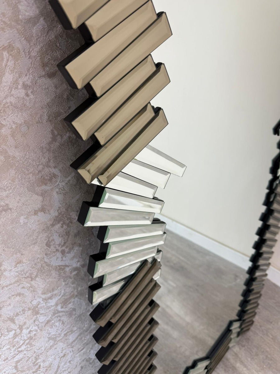 Modern radiator with a unique design on a wall.