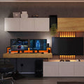 Modern home entertainment system with multiple screens and a gaming chair.